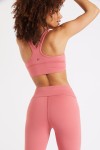 Flow Wellness pink sports bra