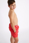 M AIR BASTOU Children's plain red swim shorts