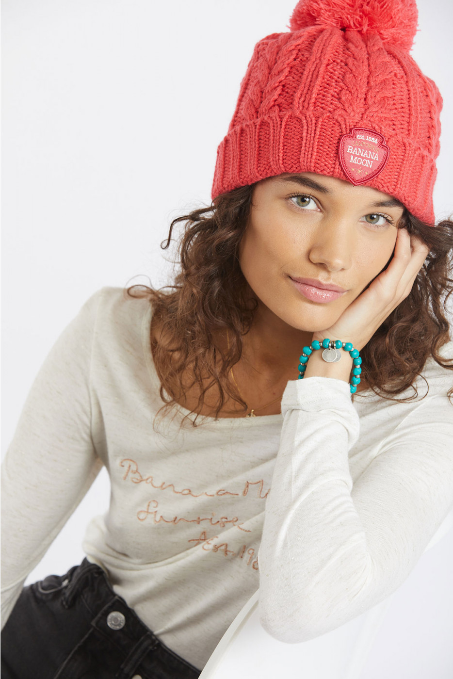 Women's coral pink cable knit pompom 