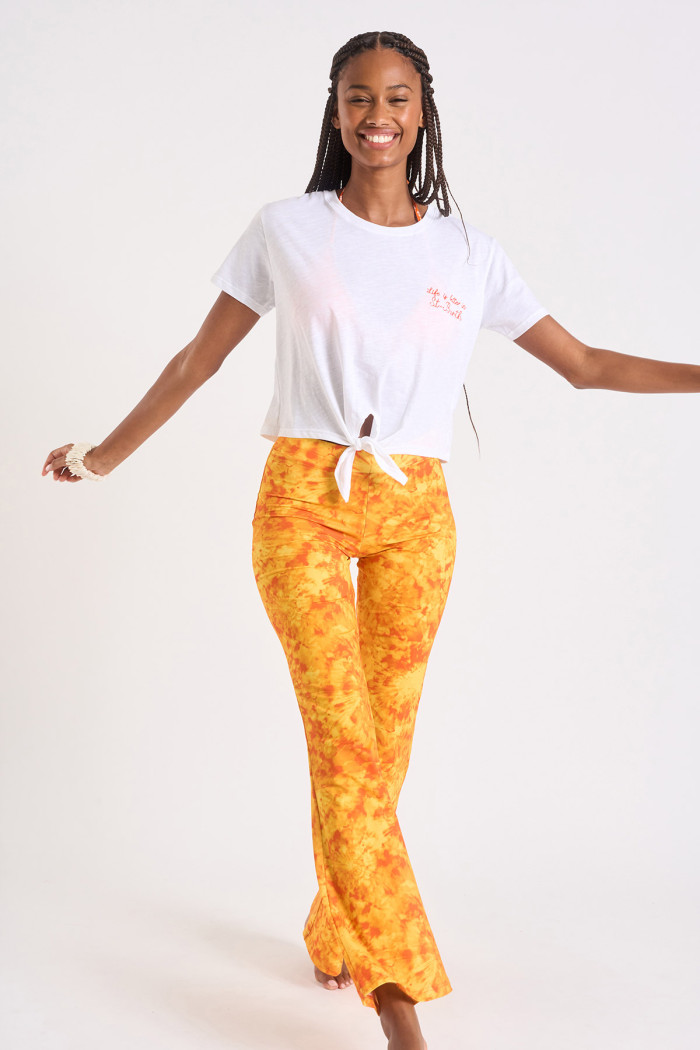 Smiledye Noelo orange tie-and-dye flared trousers