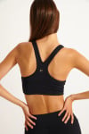 FLOW WELLNESS black sports bra