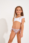 Parte inferior de bañador de niña rosa con cerezas estampadas anudado MINI MACHA BRIEF