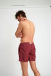 Manly Bastou men's burgundy swim trunks