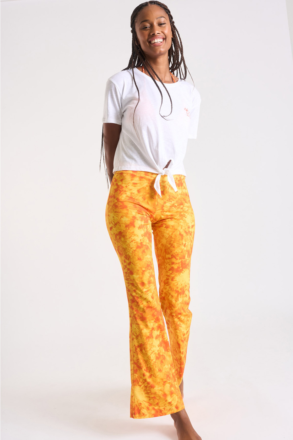 Pantaloni scampanati arancione tie-and-dye Noelo Smiledye - 2