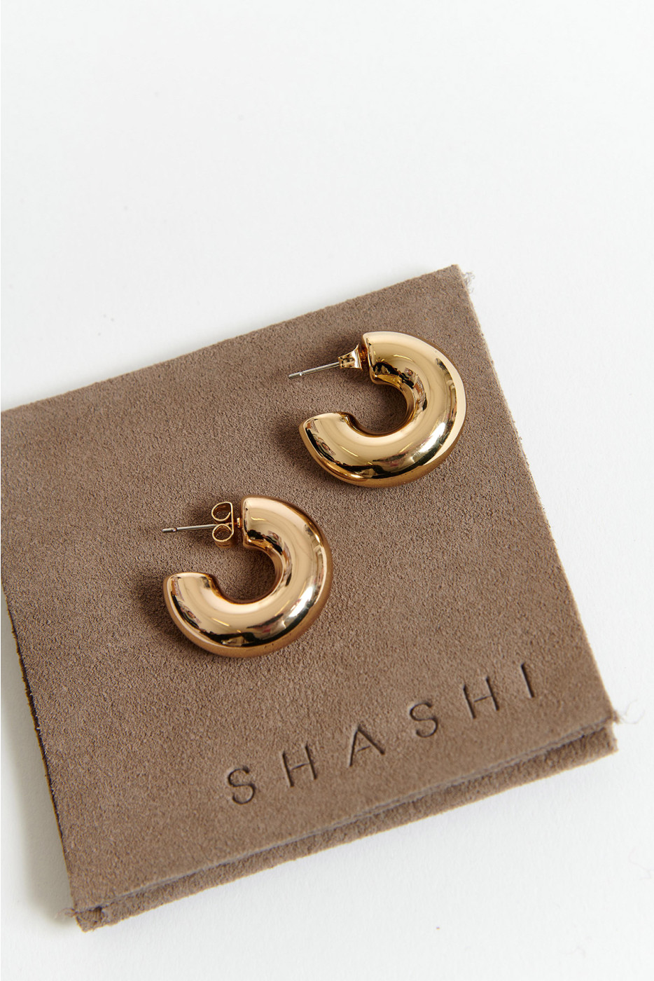 MACHINA Shashi® gold earrings