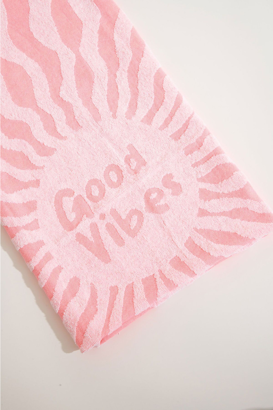 RENATA FOUTASLY Roze stranddoek met seventies-print 